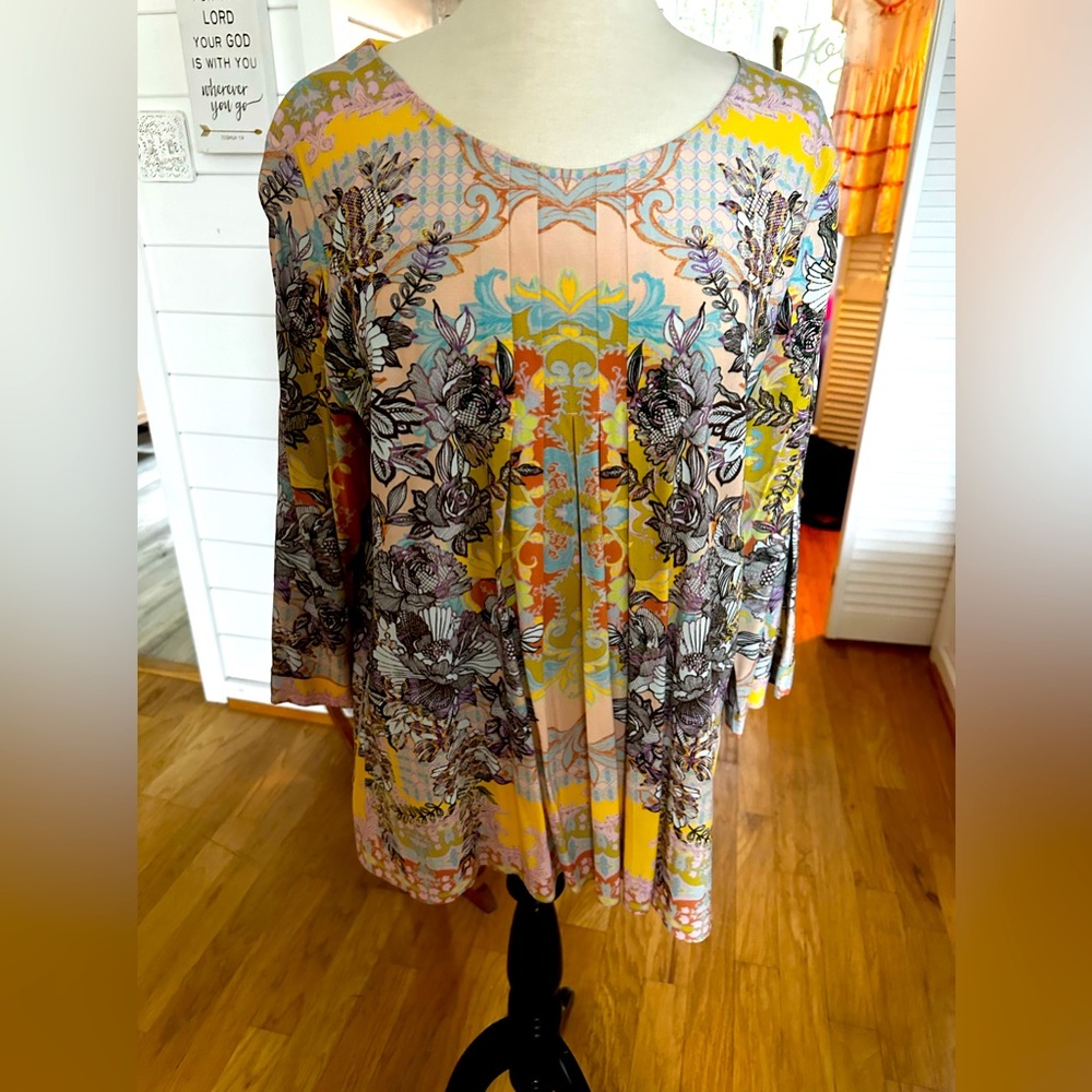 Never worn but no tags. Lovely blouse